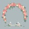 Wedding circle arch with pink flowers.