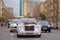 Wedding cortege in the Baku Street city centre . White luxury cars parked in luxury district near pretty houses at wedding