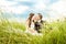 Wedding couple, bride and groom kissing in grass