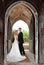 Wedding couple in church entrance