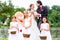 Wedding couple and flower children with doves