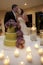 Wedding couple kissing by cake