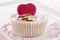 Wedding cupcake with red heart