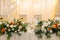 Wedding decor. Table for the newlyweds outdoor. Wedding reception. Elegant wedding table arrangement, floral decoration