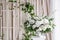 Wedding decoration, ceremony in a light tent. Gorgeous bouquet of different flowers. White floral arrangement in vintage