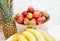 Wedding decoration with fruits on restaurant table, pineapple, bananas, nectarines, kiwi