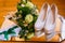 Wedding details, green Bridal bouquet, shoes, bride garter and earrings
