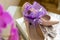 Wedding details. Purple Garter on Bride`s Slippers. Box with a gift