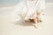 Wedding dress. beach wedding, bride and legs