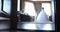 Wedding dress on a mannequin in a luxurious hall, camera movement. beautiful