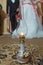 At the wedding, the father spins his daughter three times .Oil lantern lamp on the carpet . Vintage kerosene oil lantern