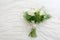 Wedding flowers Bridal bouquet of white flowers tied with a ribbon