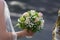 Wedding flowers in brides hand