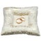 Wedding gold rings bride and groom on decorative pillow.