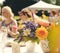 Wedding guests celebrating at a beautiful outdoor venue on a sunny day, luxury wedding decoration idea and decor