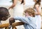 Wedding guests clapping for the bride and groom