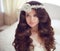 Wedding Hairstyle. Beautiful brunette bride girl model with long