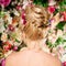 Wedding hairstyle a young girl. Bride. Woman with Flowers in her