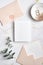 Wedding invitation mockup, pastel pink envelopes, golden rings, eucalyptus leaves on marble table. Elegant wedding stationery set