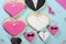 Wedding party heart shape cookies on vintage blue tray - close up