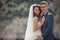 Wedding photography of a young couple, the bride and groom in a mountainous area in summer