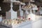 Wedding reception dessert table with delicious decorated white c