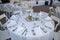 Wedding reception table with place settings.