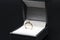 Wedding ring in a black box, Diamond ring in a dark box