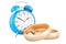 Wedding rings with alarm clock. 3D rendering