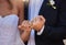 Wedding, rings and closeup of a couple with a pinky promise for love, loyalty and marriage. Romance, hands and married