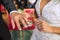 The wedding rings. Hands of the bride and groom with wedding rings