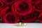 Wedding rings and roses.