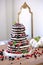 Wedding rustic naked cake with fruits on wooden background