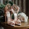 Wedding shoes with lace on the wooden table. Wedding details