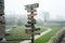 Wedding signs on a wooden pole