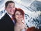 Wedding snowboarders couple just married at mountain winter