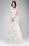 Wedding Style. Sophisticated Newlywed in White Bridal Dress. Elegance