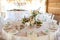 Wedding table appointments with beautiful decor and flowers