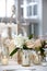 Wedding table decoration series - soft pink and white bouquet of flowers in vases