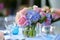 Wedding table decorations in pink and blue. Floral design, special event table set up, wedding outdoor celebration party, banquet