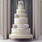 Wedding Theme, Large Modern style multi tiered intricate white wedding cake, gold detailed motif with soft pink colored roses