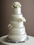 Wedding Theme, Modern style multi-tiered wedding cake intricate motif with white and soft peach color rose decoration