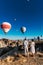 Wedding travel. Honeymoon trip. Couple in love among balloons. A guy proposes to a girl. Couple in love in Cappadocia.