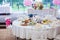 Wedding white banquet tables prepared for