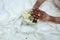 Weddinge morocco.White Bridal details-Women hand with red henna