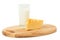 Wedge of cheese and glass of milk on a cheese board