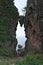 A wedge-shaped rock between two giant rocks or Benkei no Hasamiiwa at Sado island, Japan