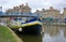 Wedlake Street bridge & barge. Grand Union Canal. UK