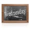 Wednesday text written on blackboard