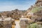 Weeds growing on the wall of ruins of the walls in the Amman Citadel, a historical site at the center of downtown Amman, Jordan.